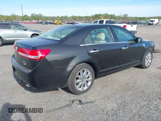2012 Lincoln MKZ with VIN 3LNHL2JC5CR829225, listed as a IAAI auction lot 42088988 with 121,136 mi miles. Bid and sale history available at carsss.com. Image 4.
