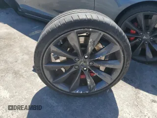 2013 Tesla Model S Performance с VIN 5YJSA1CP1DFP26946, выставлен на аукционе Copart как лот 50133094 с пробегом 80 045 миль миль и Списание • Salvage title. История ставок и продаж доступна на DreamBid. Изображение 12.
