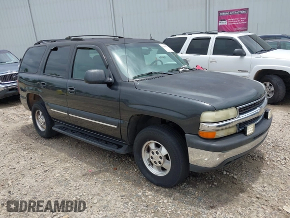 2004 Chevrolet Tahoe LT with VIN 1GNEC13Z14R203713, listed as a IAAI auction lot 42490743 with 216,529 mi miles and . Bid and sale history available at DreamBid. Image 1.