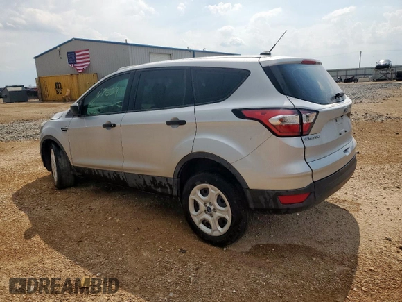 2018 Ford Escape S z VIN 1FMCU0F73JUD50086, wystawiony jako Copart lot #65004825 z przebiegiem Nie podano mil oraz Szkoda całkowita • Salvage title. Historia ofert i sprzedaży dostępna na DreamBid. Obrazek 2.