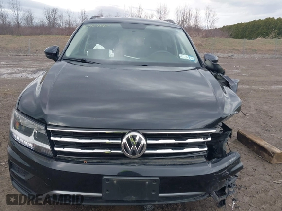 2019 Volkswagen Tiguan S with VIN 3VV0B7AX0KM046024, listed as a IAAI auction lot 41924867 with 126,729 mi miles and . Bid and sale history available at DreamBid. Image 13.