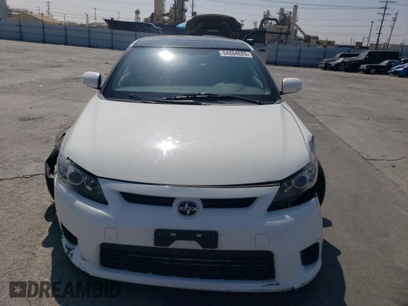 2013 Scion tC z VIN JTKJF5C77D3063067, wystawiony jako Copart lot #54264625 z przebiegiem 74 351 mil mil oraz Szkoda całkowita • Salvage title. Historia ofert i sprzedaży dostępna na DreamBid. Obrazek 5.