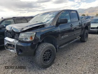 2010 Nissan Titan XE with VIN 1N6BA0EJ5AN318639, listed as a Copart auction lot 69776984 with 158,913 mi miles and Salvage Title. Bid and sale history available at carsss.com. Image 1.