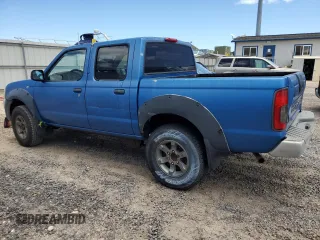 2001 Nissan Frontier SE with VIN 1N6ED27T91C390230, listed as a Copart auction lot 58844905 with 157,883 mi miles and Salvage title. Bid and sale history available at DreamBid. Image 2.