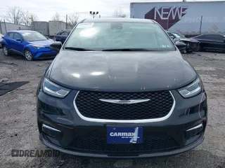 2023 Chrysler Pacifica Hybrid Touring L z VIN 2C4RC1L70PR575342, wystawiony jako IAAI lot #41946079 z przebiegiem 36 304 mil mil oraz . Historia ofert i sprzedaży dostępna na DreamBid. Obrazek 12.