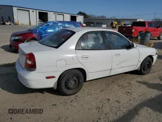 2001 Daewoo Nubira z VIN KLAJC52Z01K711120, wystawiony jako Copart lot #48926575 z przebiegiem 103 375 mil mil oraz Tytuł czysty. Historia ofert i sprzedaży dostępna na DreamBid. Obrazek 3.