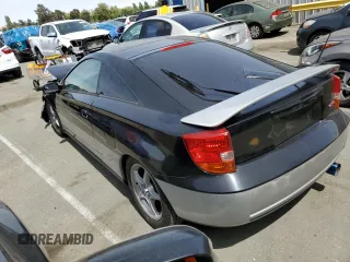 2000 Toyota Celica GTS with VIN JTDDY38T1Y0015712, listed as a Copart auction lot 57557284 with 166,453 mi miles and Salvage Title. Bid and sale history available at carsss.com. Image 2.
