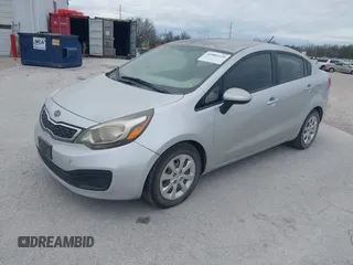 2012 Kia Rio SX with VIN KNADN4A33C6050974, listed as a IAAI auction lot 41886129 with 167,777 mi miles. Bid and sale history available at carsss.com. Image 2.