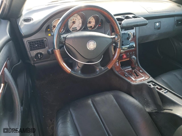 2002 Mercedes-Benz SLK-Class 3.2L with VIN WDBKK65F32F243268, listed as a Copart auction lot 88910165 with 156,021 mi miles and Salvage Title. Bid and sale history available at carsss.com. Image 8.