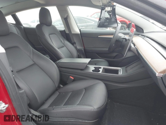 2023 Tesla Model 3 Long Range with VIN 5YJ3E1EB6PF388801, listed as a IAAI auction lot 41610678 with 20,144 mi miles and . Bid and sale history available at DreamBid. Image 5.