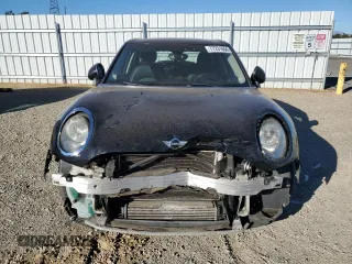 2017 MINI Clubman Cooper with VIN WMWLN5C53H2E32391, listed as a Copart auction lot 77231654 with 105,842 mi miles and Salvage Title. Bid and sale history available at carsss.com. Image 5.