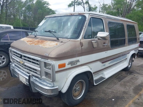 1989 Chevrolet Chevy Van z VIN 1GBEG25K3K7108022, wystawiony jako IAAI lot #42105947 z przebiegiem 51 822 mil mil oraz . Historia ofert i sprzedaży dostępna na DreamBid. Obrazek 2.