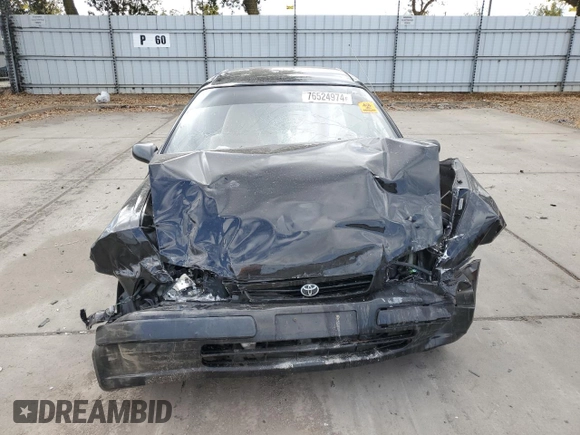 1996 Toyota Tercel DX z VIN JT2AC52LXT0157984, wystawiony jako Copart lot #76524974 z przebiegiem Nie podano mil oraz Szkoda całkowita • Salvage title. Historia ofert i sprzedaży dostępna na DreamBid. Obrazek 5.