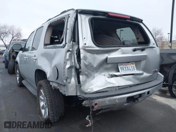 2013 GMC Yukon SLT with VIN 1GKS1CE07DR157076, listed as a IAAI auction lot 41557228 with 148,242 mi miles. Bid and sale history available at carsss.com. Image 6.