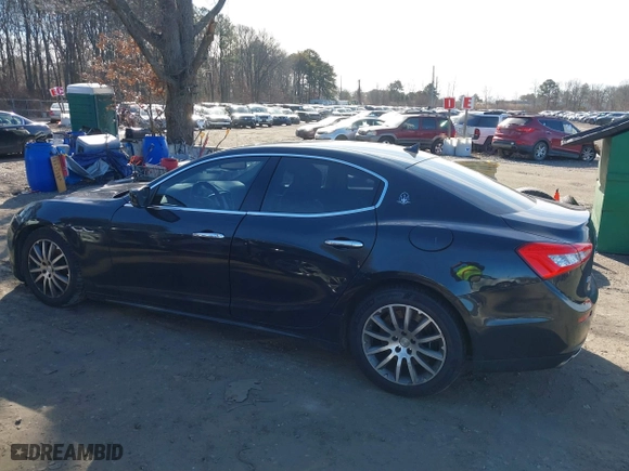 2014 Maserati Ghibli S Q4 with VIN ZAM57RTA1E1091738, listed as a IAAI auction lot 41518359 with 75,641 mi miles. Bid and sale history available at carsss.com. Image 14.