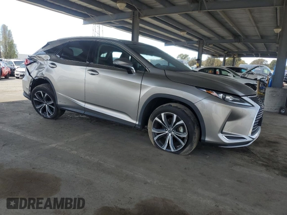 2021 Lexus RX 450h z VIN 2T2HGMDA0MC067651, wystawiony jako Copart lot #52595355 z przebiegiem Nie podano mil oraz Szkoda całkowita • Salvage title. Historia ofert i sprzedaży dostępna na DreamBid. Obrazek 4.