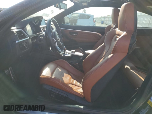 2015 BMW M4 with VIN WBS3R9C50FK335084, listed as a Copart auction lot 61962965 with 142,157 mi miles and Salvage title. Bid and sale history available at DreamBid. Image 7.