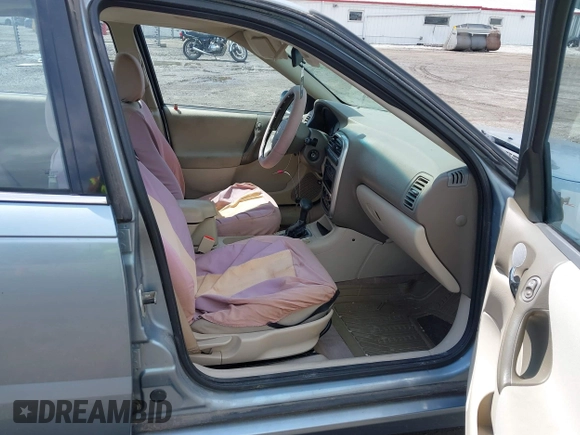 2003 Saturn LS with VIN 1G8JU54F93Y573838, listed as a IAAI auction lot 42101242 with 208,677 mi miles. Bid and sale history available at carsss.com. Image 5.