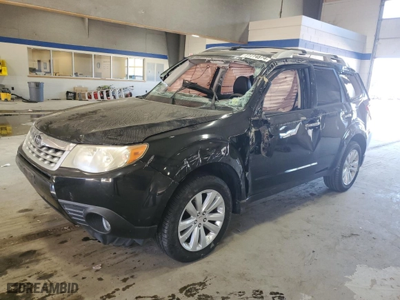 2011 Subaru Forester 2.5X Touring with VIN JF2SHBGC5BH754630, listed as a Copart auction lot 77774974 with NaN miles and Clean Title. Bid and sale history available at carsss.com. Image 1.