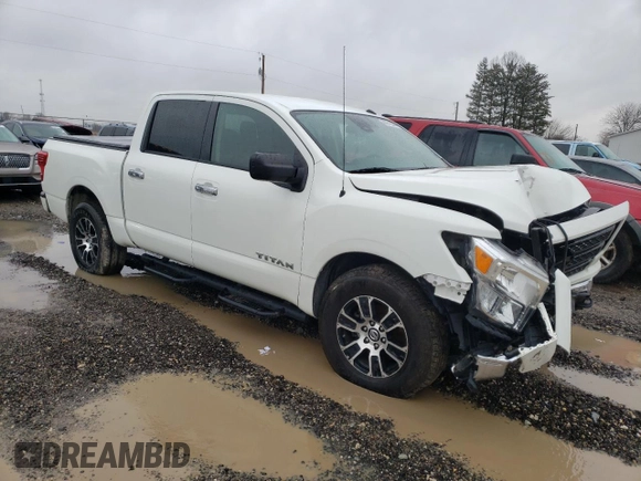2021 Nissan Titan S with VIN 1N6AA1EC2MN529675, listed as a Copart auction lot 86612844 with 56,597 mi miles and Salvage title. Bid and sale history available at DreamBid. Image 4.