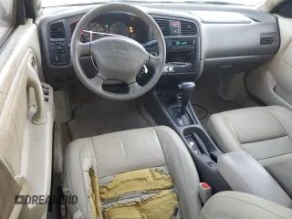 1999 Infiniti G20 z VIN JNKCP11A7XT020372, wystawiony jako Copart lot #73639514 z przebiegiem 174 467 mil mil oraz Szkody całkowita. Historia ofert i sprzedaży dostępna na DreamBid. Obrazek 8.