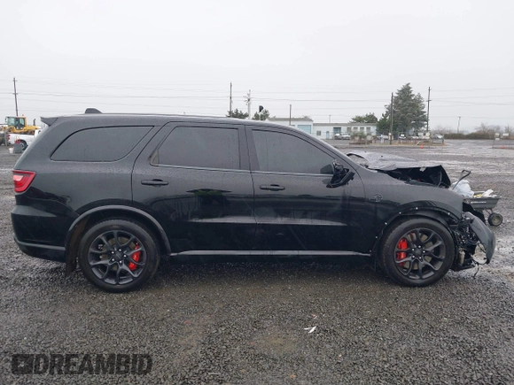 2021 Dodge Durango SRT Hellcat with VIN 1C4SDJH95MC643177, listed as a IAAI auction lot 41007139 with 31,650 mi miles and . Bid and sale history available at DreamBid. Image 14.