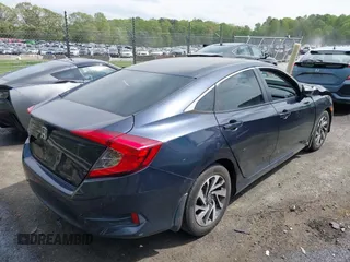 2016 Honda Civic EX with VIN 19XFC2F7XGE057647, listed as a IAAI auction lot 42016303 with 157,106 mi miles. Bid and sale history available at carsss.com. Image 4.
