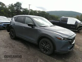 2023 Mazda CX-5 2.5 S Carbon Edition with VIN JM3KFBCM1P0209900, listed as a IAAI auction lot 37342913 with 3,853 mi miles. Bid and sale history available at carsss.com. Image 1.