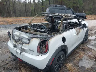 2017 MINI Convertible Cooper with VIN WMWWG5C30H3C20290, listed as a IAAI auction lot 41750397 with 1 mi miles. Bid and sale history available at carsss.com. Image 4.