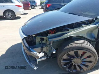 2024 Tesla Model Y Performance with VIN 7SAYGDEF1RA329825, listed as a IAAI auction lot 41762602 with 3,923 mi miles and . Bid and sale history available at DreamBid. Image 20.