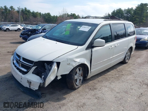2012 Dodge Grand Caravan SXT with VIN 2C4RDGCGXCR358794, listed as a IAAI auction lot 42007316 with 212,518 mi miles and . Bid and sale history available at DreamBid. Image 2.