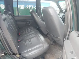 1999 Ford Explorer XLT z VIN 1FMZU32E7XZB57306, wystawiony jako IAAI lot #41519800 z przebiegiem 226 932 mil mil oraz . Historia ofert i sprzedaży dostępna na DreamBid. Obrazek 8.