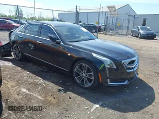2018 Cadillac CT6 Sport AWD z VIN 1G6KN5R61JU101754, wystawiony jako IAAI lot #42128916 z przebiegiem 90 487 mil mil oraz . Historia ofert i sprzedaży dostępna na DreamBid. Obrazek 1.
