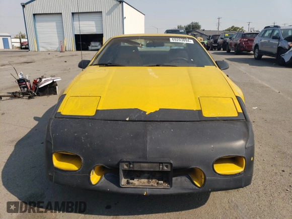1986 Pontiac Fiero z VIN 1G2PG9796GP256622, wystawiony jako Copart lot #69203894 z przebiegiem 38 964 mil mil oraz Szkody całkowita. Historia ofert i sprzedaży dostępna na DreamBid. Obrazek 5.