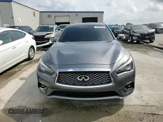 2023 Infiniti Q50 Luxe z VIN JN1EV7BR2PM541987, wystawiony jako Copart lot #53506195 z przebiegiem 65 202 mil mil oraz Szkoda całkowita • Salvage title. Historia ofert i sprzedaży dostępna na DreamBid. Obrazek 13.