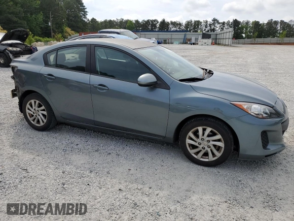 2012 Mazda 3 i Touring with VIN JM1BL1V71C1694546, listed as a Copart auction lot 55103025 with 148,810 mi miles and Salvage title. Bid and sale history available at DreamBid. Image 4.