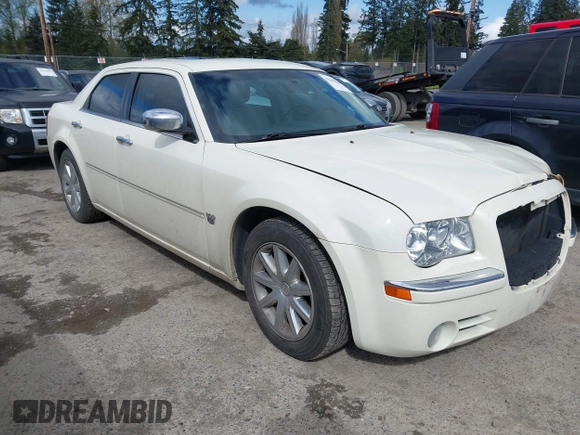 2007 Chrysler 300 C with VIN 2C3KA63HX7H898174, listed as a IAAI auction lot 42000604 with 73,493 mi miles. Bid and sale history available at carsss.com. Image 1.