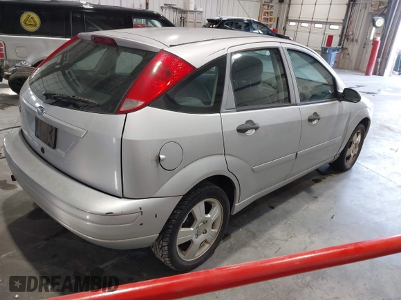 2007 Ford Focus S with VIN 1FAHP37N67W221827, listed as a IAAI auction lot 41067945 with 126,489 mi miles and . Bid and sale history available at carsss.com. Image 4.