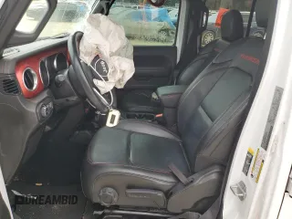 2022 Jeep Wrangler Unlimited Rubicon with VIN 1C4HJXFNXNW133624, listed as a Copart auction lot 48222615 with 51,849 mi miles and Salvage title. Bid and sale history available at DreamBid. Image 7.