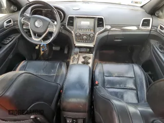 2017 Jeep Grand Cherokee Overland with VIN 1C4RJFCG0HC762612, listed as a Copart auction lot 57400095 with 122,702 mi miles and Salvage title. Bid and sale history available at DreamBid. Image 8.