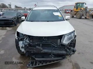 2017 Nissan Rogue SV with VIN JN8AT2MT2HW380211, listed as a IAAI auction lot 41672425 with 39,700 mi miles and . Bid and sale history available at DreamBid. Image 13.