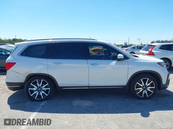 2022 Honda Pilot Touring 7-Passenger с VIN 5FNYF5H66NB034248, выставлен на аукционе IAAI как лот 41777362 с пробегом 26 611 миль миль и . История ставок и продаж доступна на DreamBid. Изображение 12.