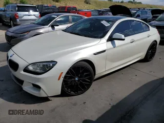 2015 BMW 6 Series 650i xDrive with VIN WBA6B4C55FD761396, listed as a Copart auction lot 61322034 with 138,024 mi miles and Clean Title. Bid and sale history available at DreamBid. Image 1.