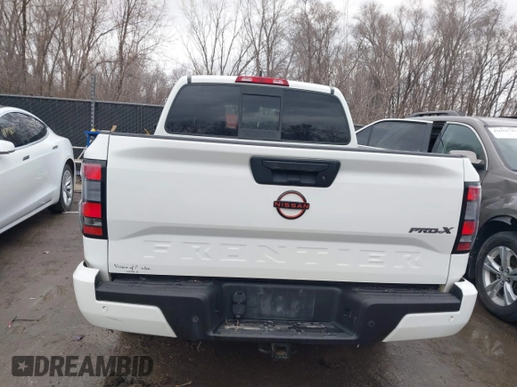 2022 Nissan Frontier SV z VIN 1N6ED1EJ2NN646035, wystawiony jako IAAI lot #41702459 z przebiegiem 93 030 mil mil oraz . Historia ofert i sprzedaży dostępna na DreamBid. Obrazek 17.