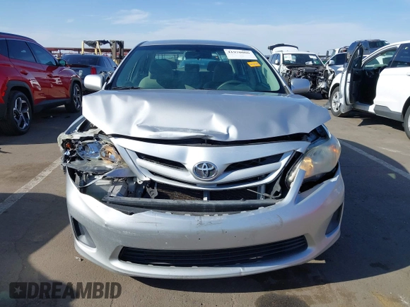 2011 Toyota Corolla L with VIN 2T1BU4EE7BC566402, listed as a IAAI auction lot 41970006 with 244,127 mi miles. Bid and sale history available at carsss.com. Image 6.