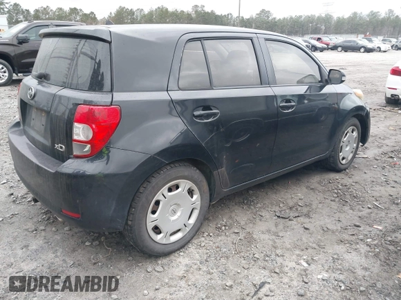 2010 Scion xD with VIN JTKKU4B45AJ058839, listed as a IAAI auction lot 41708936 with 214,685 mi miles. Bid and sale history available at carsss.com. Image 4.