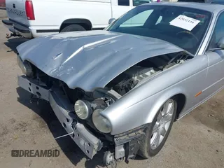 2004 Jaguar XJ 8 with VIN SAJEA71C74SG11470, listed as a IAAI auction lot 42032116 with 209,821 mi miles and . Bid and sale history available at DreamBid. Image 18.