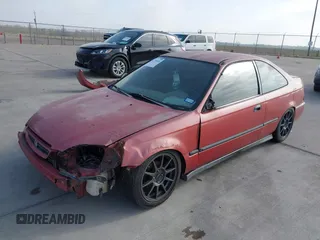 1996 Honda Civic DX with VIN 1HGEJ6125TL056431, listed as a IAAI auction lot 41770145 with 210,240 mi miles. Bid and sale history available at carsss.com. Image 2.