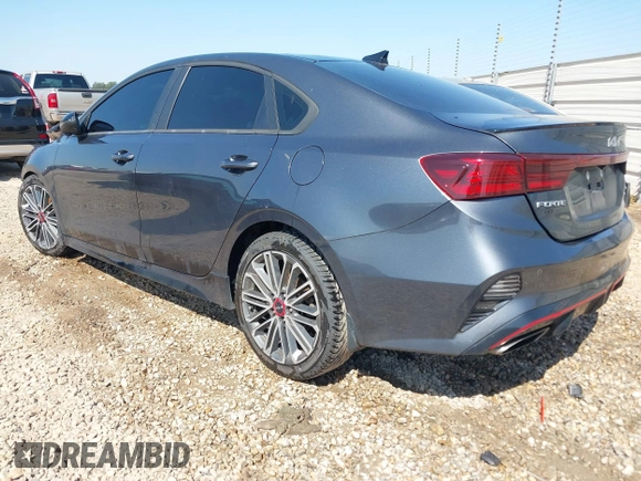 2022 Kia Forte GT with VIN 3KPF44AC7NE473424, listed as a IAAI auction lot 42003311 with 58,888 mi miles. Bid and sale history available at carsss.com. Image 3.