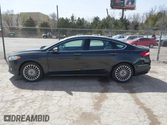 2015 Ford Fusion Titanium with VIN 3FA6P0K99FR268450, listed as a IAAI auction lot 41805513 with 202,009 mi miles. Bid and sale history available at carsss.com. Image 15.
